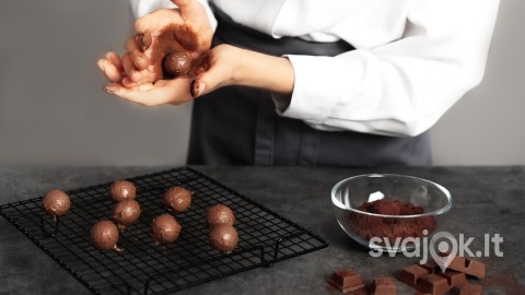 young-woman-making-chocolate-truffle